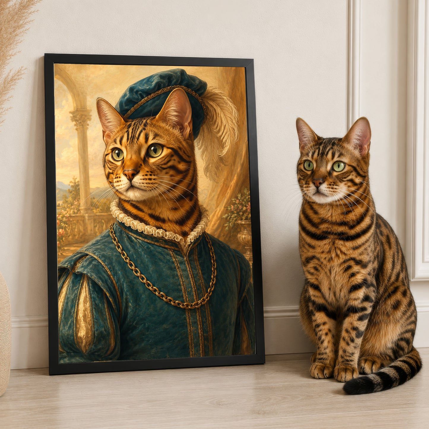 A large framed painting of a tiger cat wearing a green outfit and hat, with a smaller cat sitting next to it on the floor.